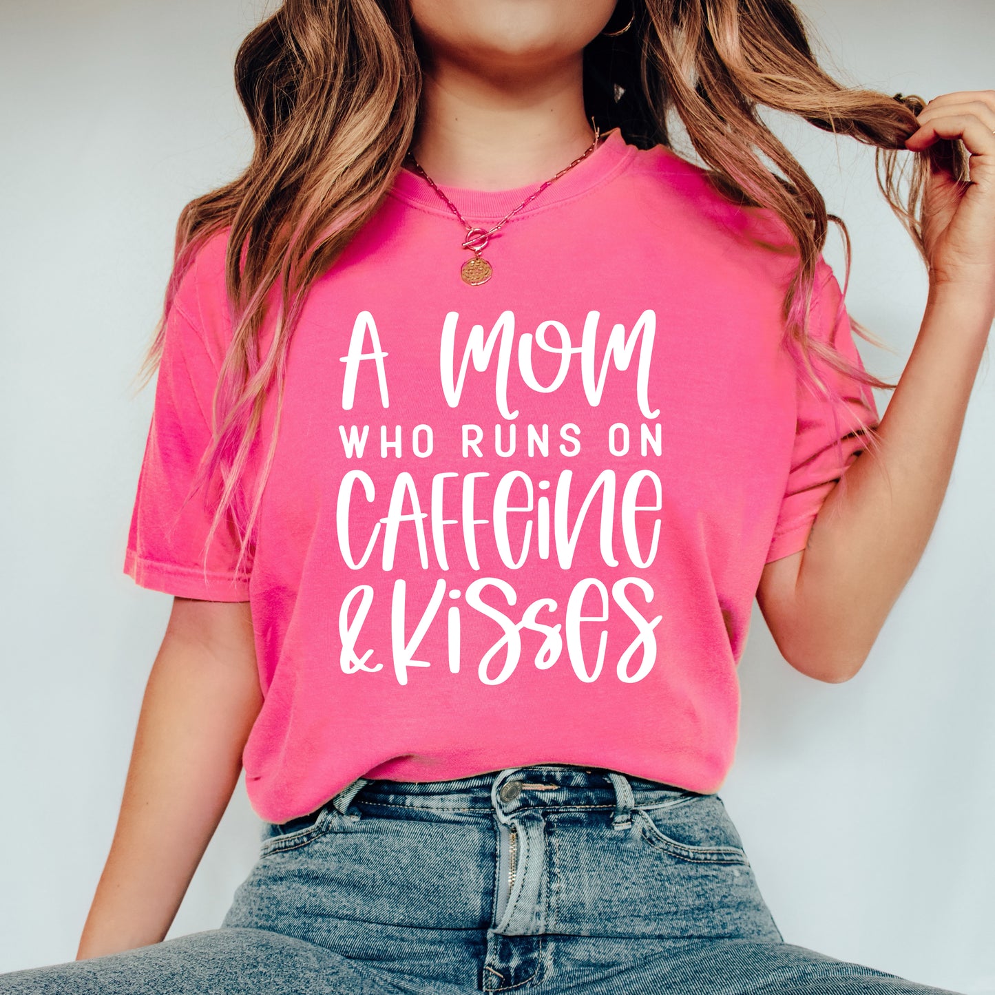 A Mom Who Runs On Caffeine And Kisses | Garment Dyed Short Sleeve Tee