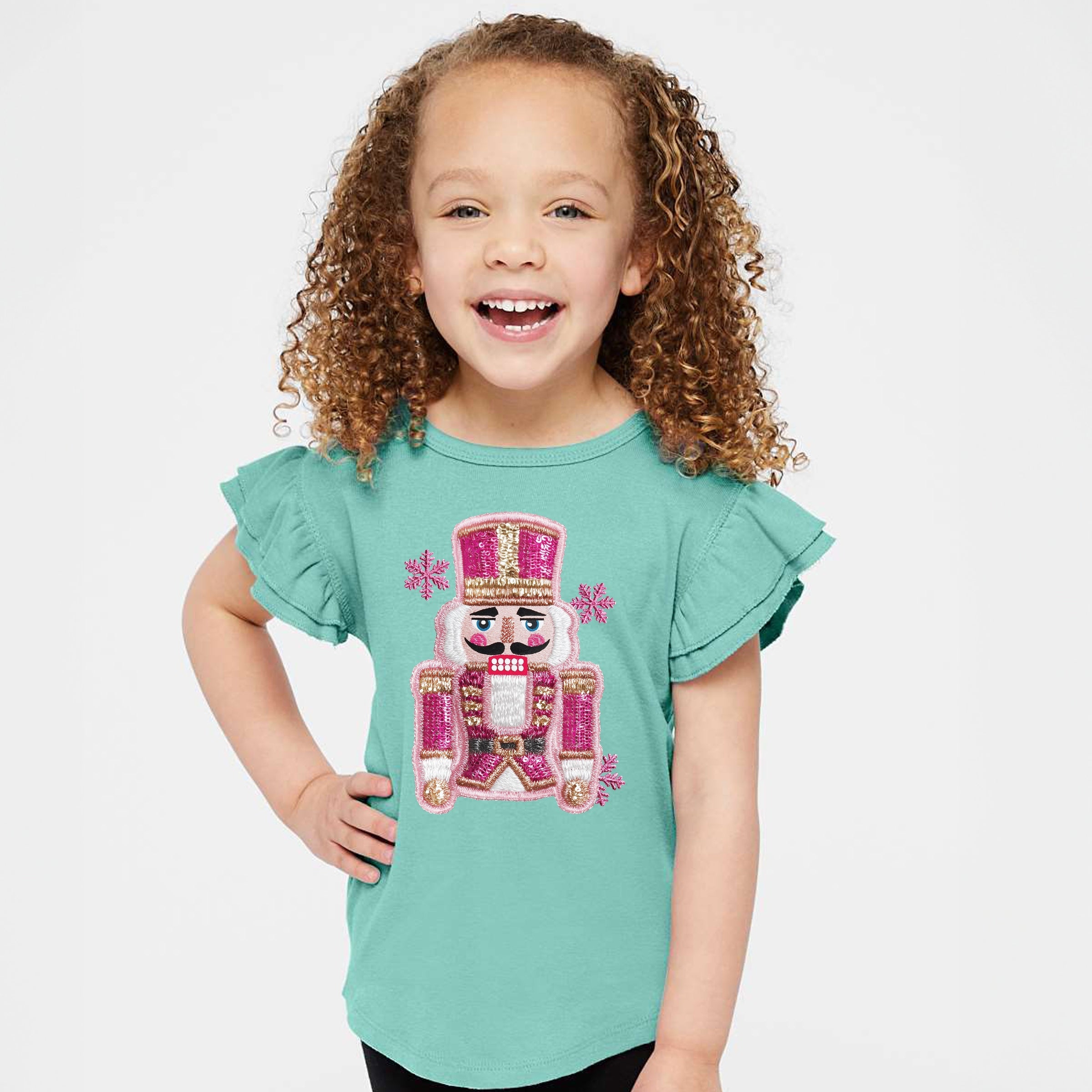 Pink Snowflake Nutcracker Patchwork Print - Flutter Sleeve Graphic T-Shirt