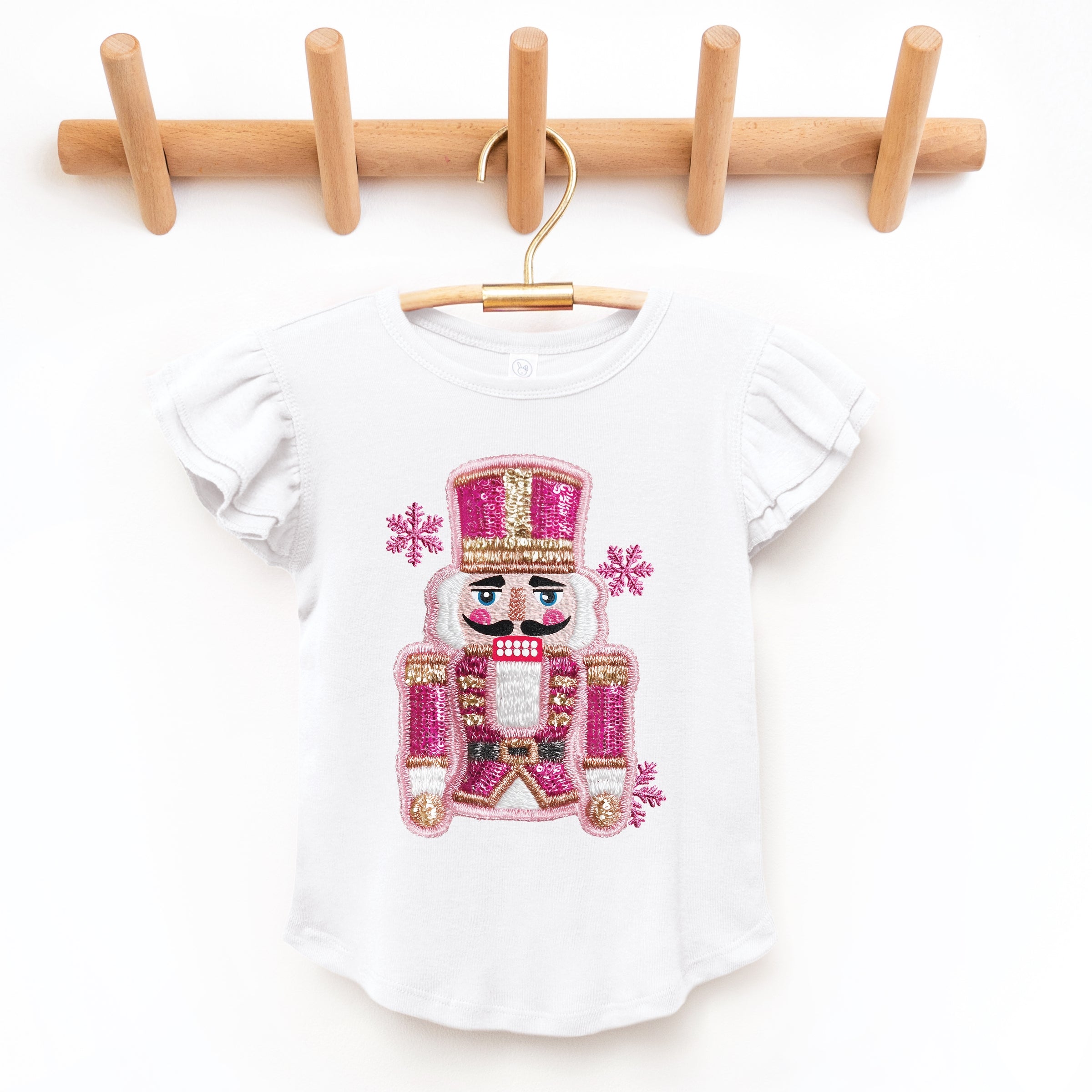 Pink Snowflake Nutcracker Patchwork Print - Flutter Sleeve Graphic T-Shirt