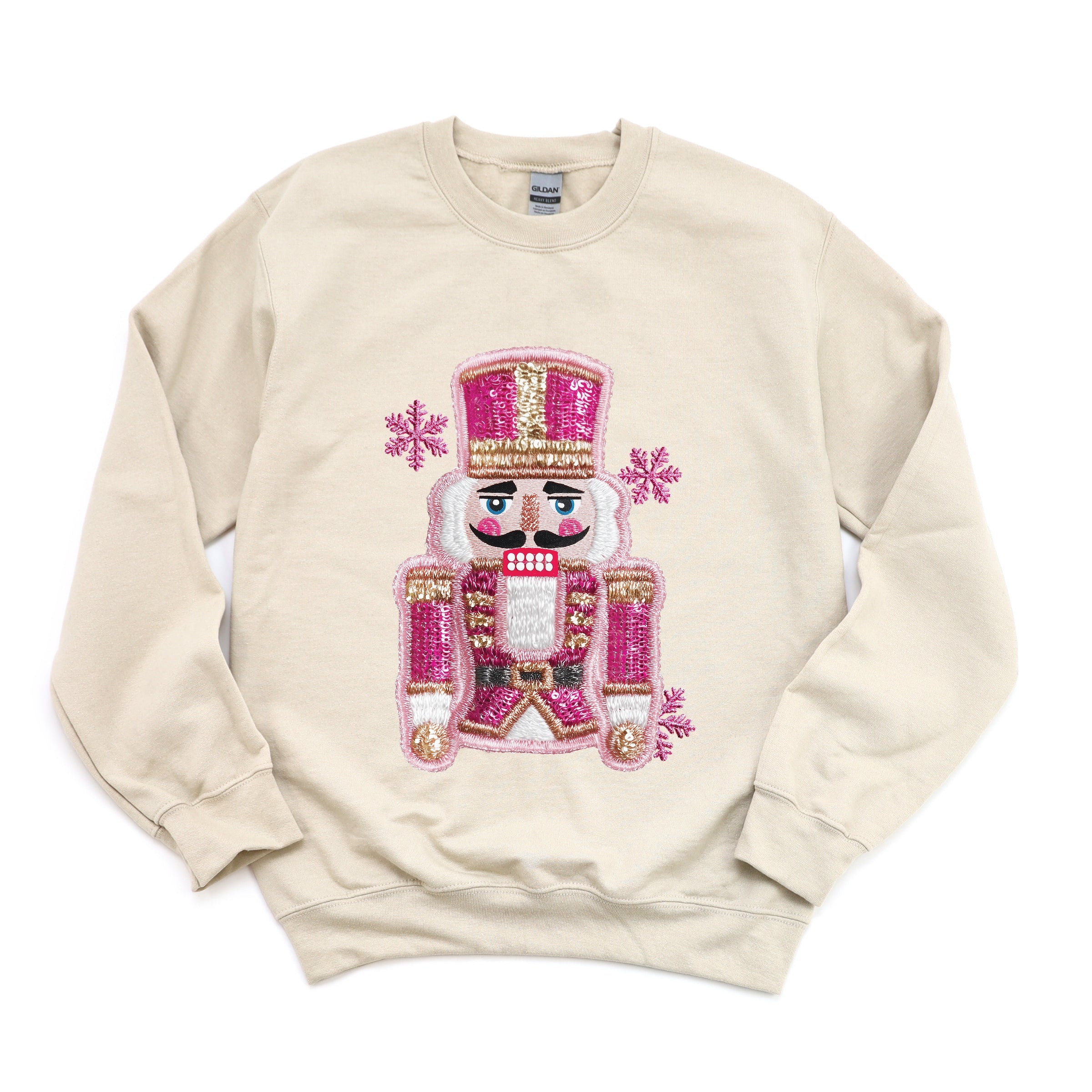 Pink Snowflake Nutcracker Patchwork Print - Women's Graphic Sweatshirt