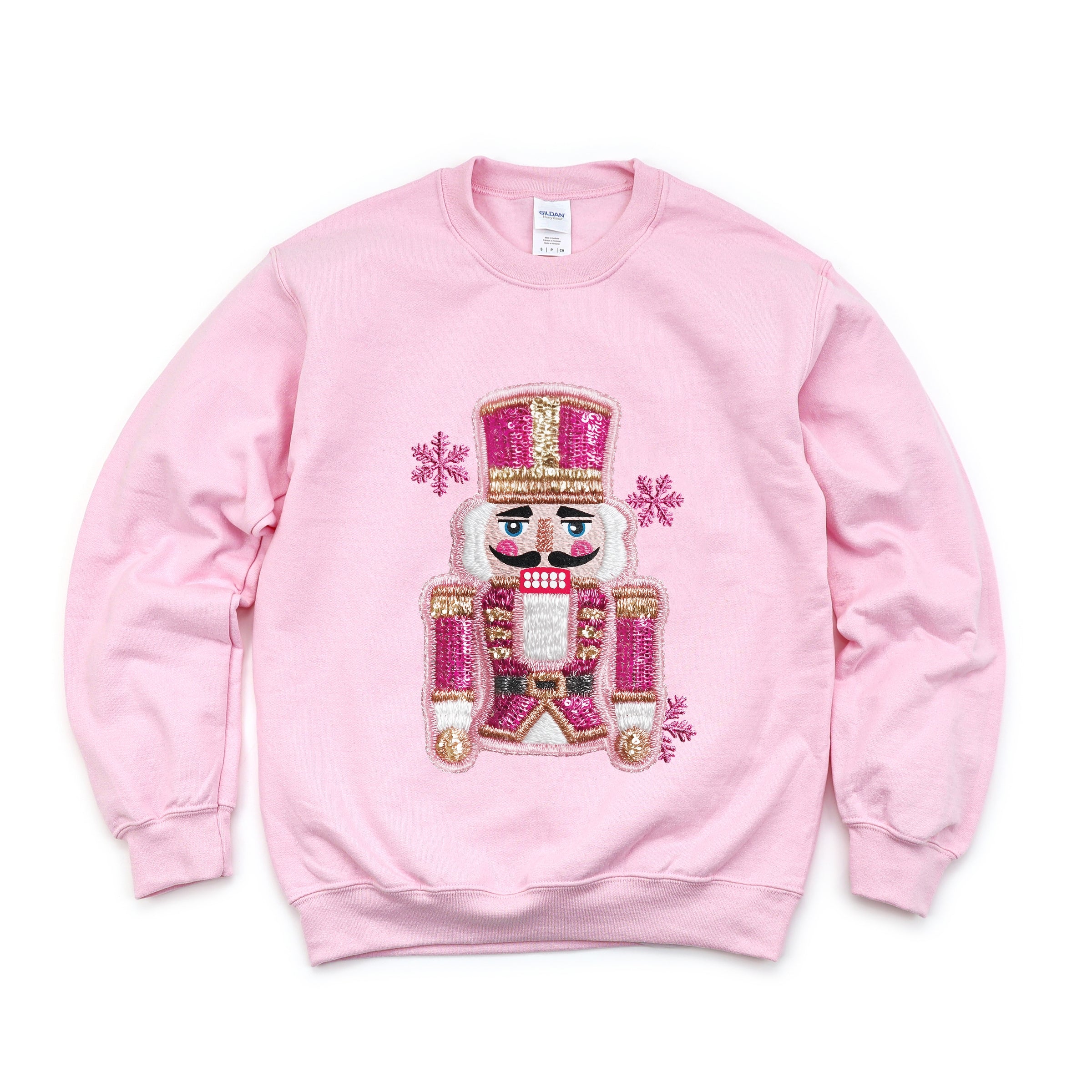 Pink Snowflake Nutcracker Patchwork Print - Women's Graphic Sweatshirt