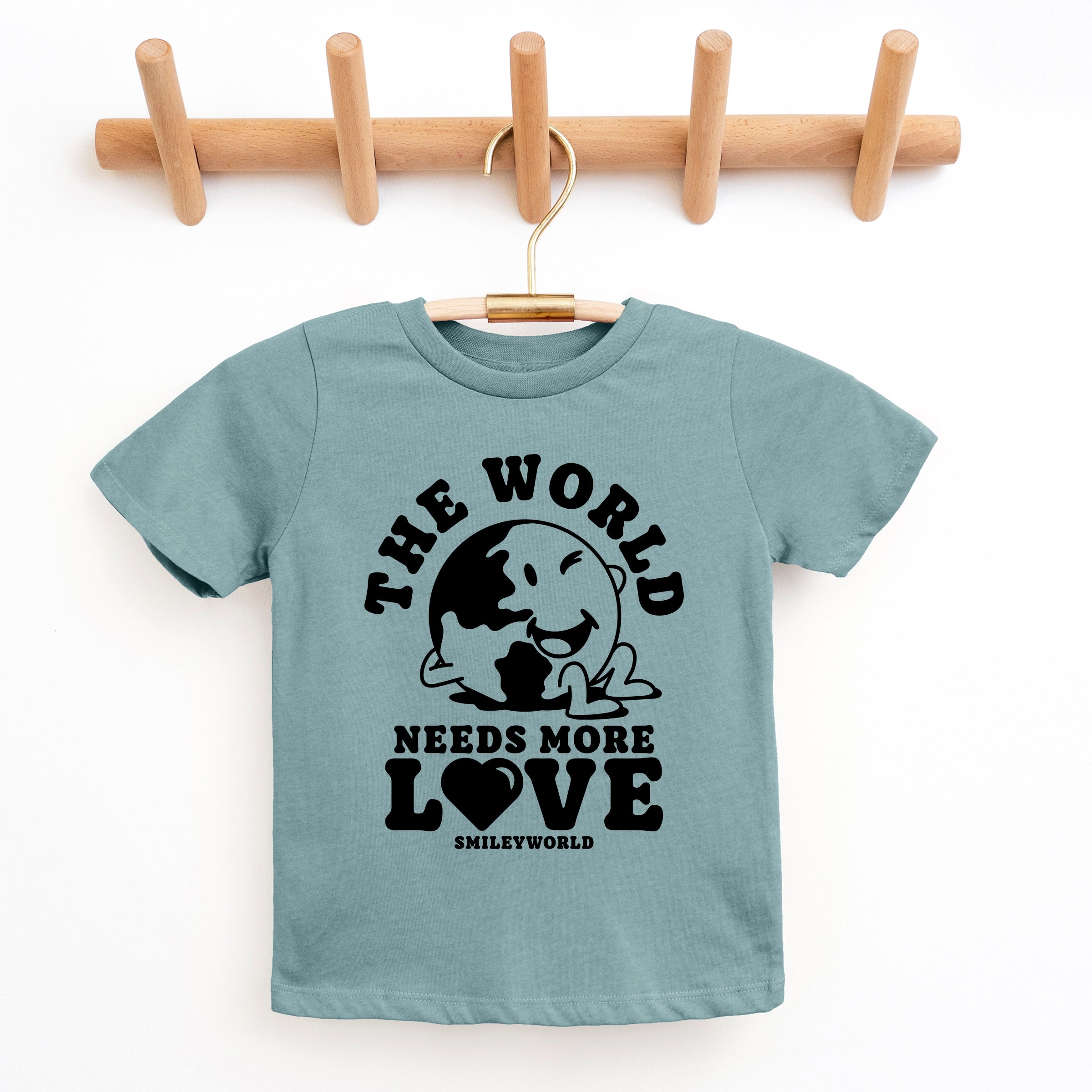 SmileyWorld The World Needs More Love - Youth Short Sleeve Graphic T-Shirt