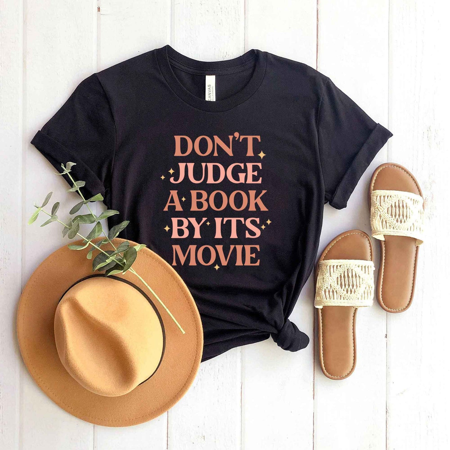 Don't Judge A Book By It's Movie | Short Sleeve Graphic Tee