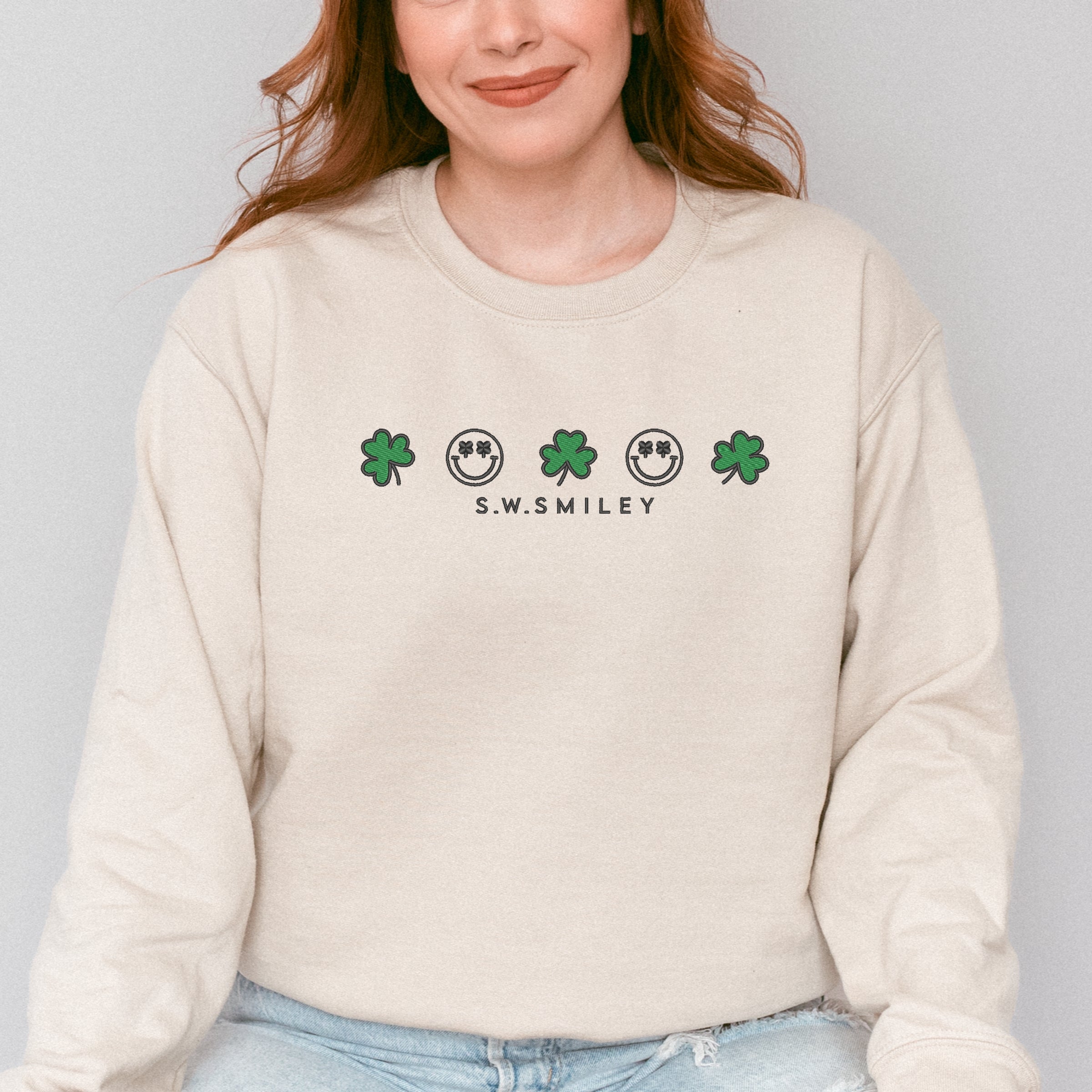 Embroidered S.W. Smiley Clovers Row - Women's Graphic Sweatshirt