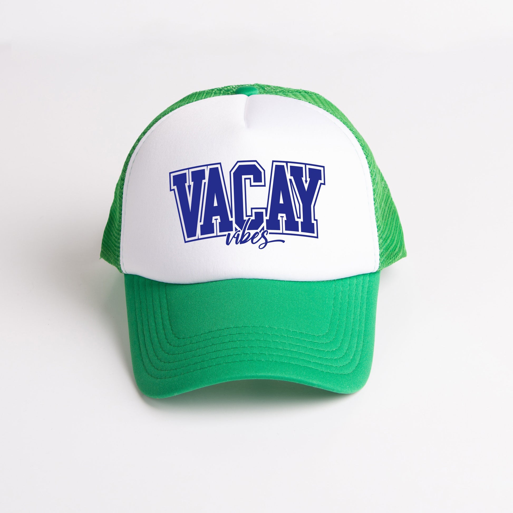 a green and white hat with the word vacay on it