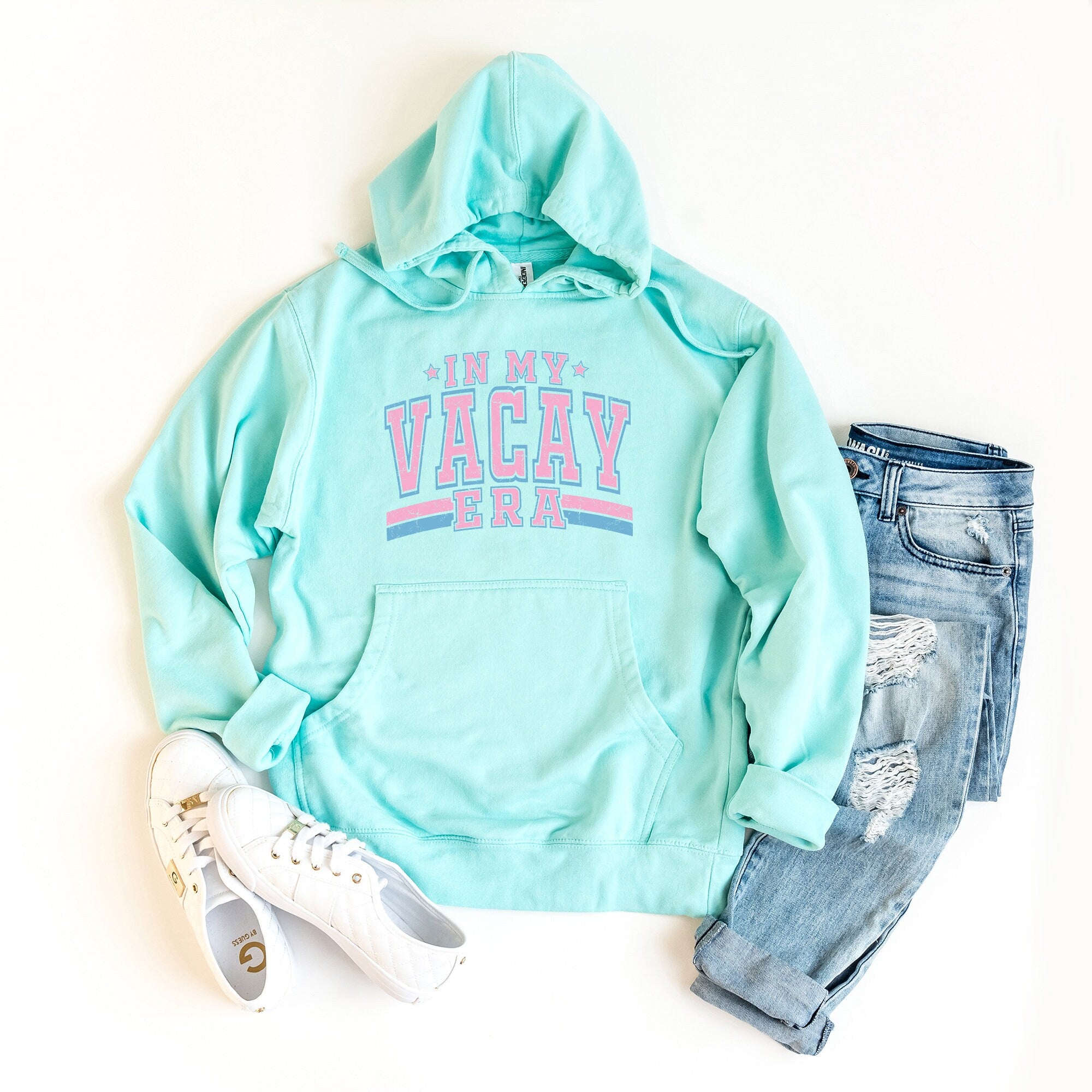 a light blue hoodie with the words i'm my vacay girl