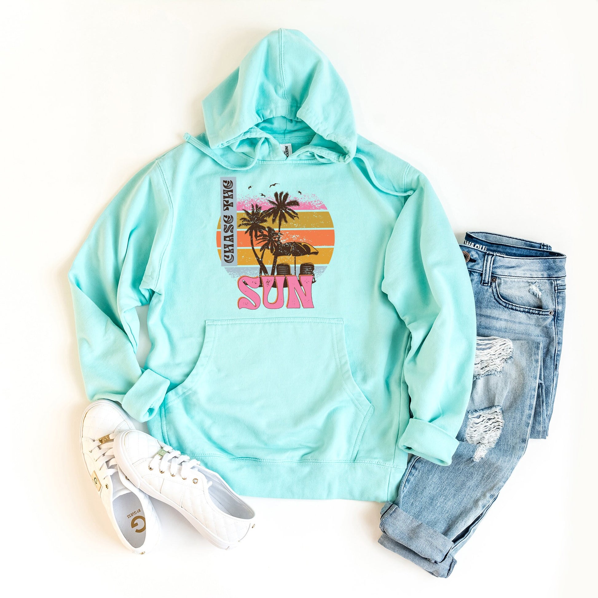 a blue hoodie with a palm tree on it