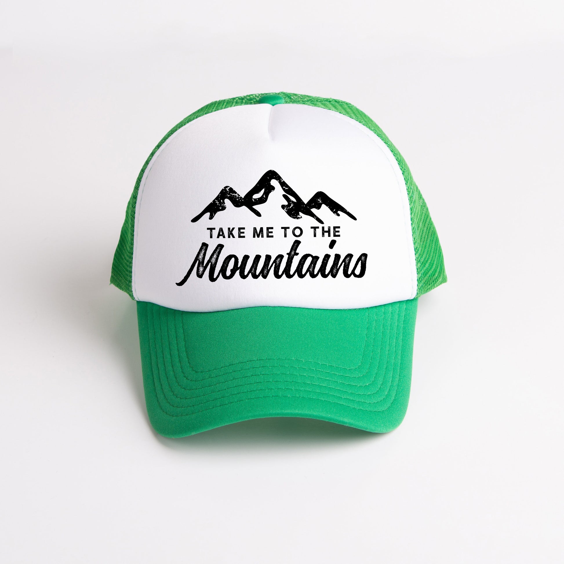 a green and white hat that says take me to the mountains