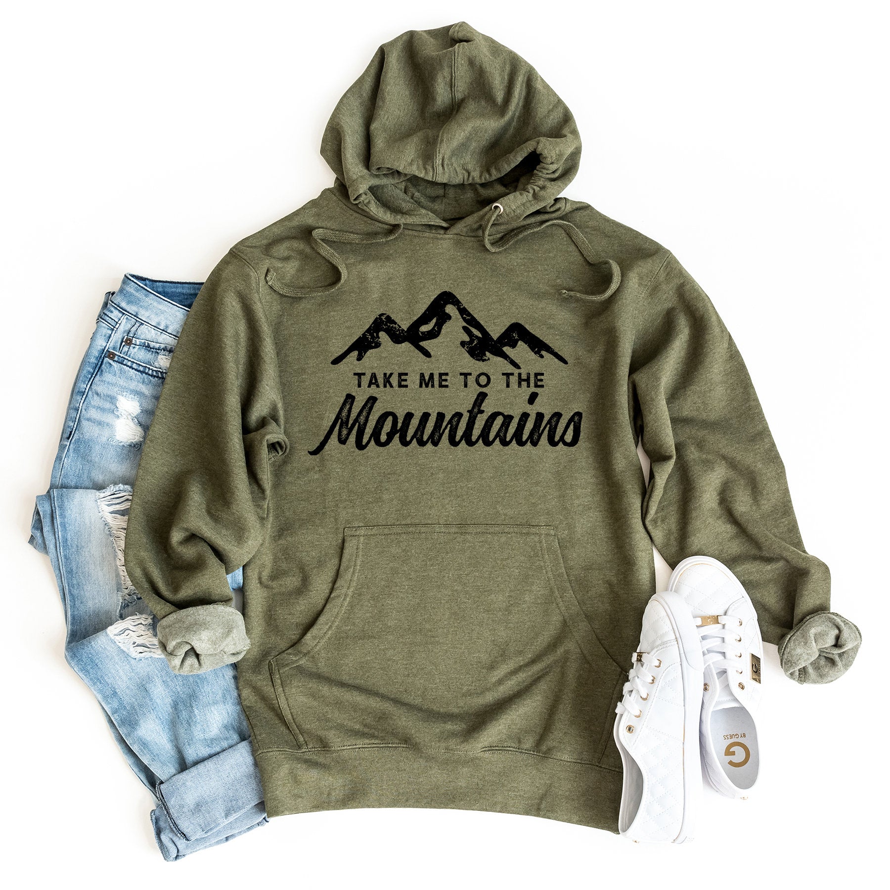 a green sweatshirt with the words take me to the mountains on it