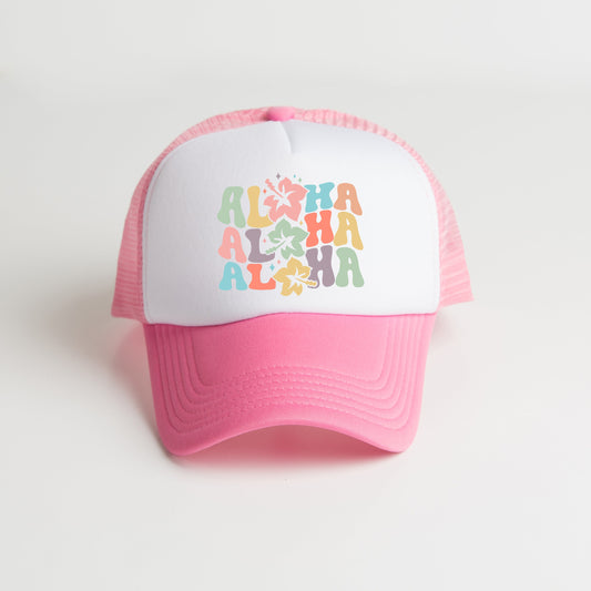 a pink and white trucker hat with the words aloha on it