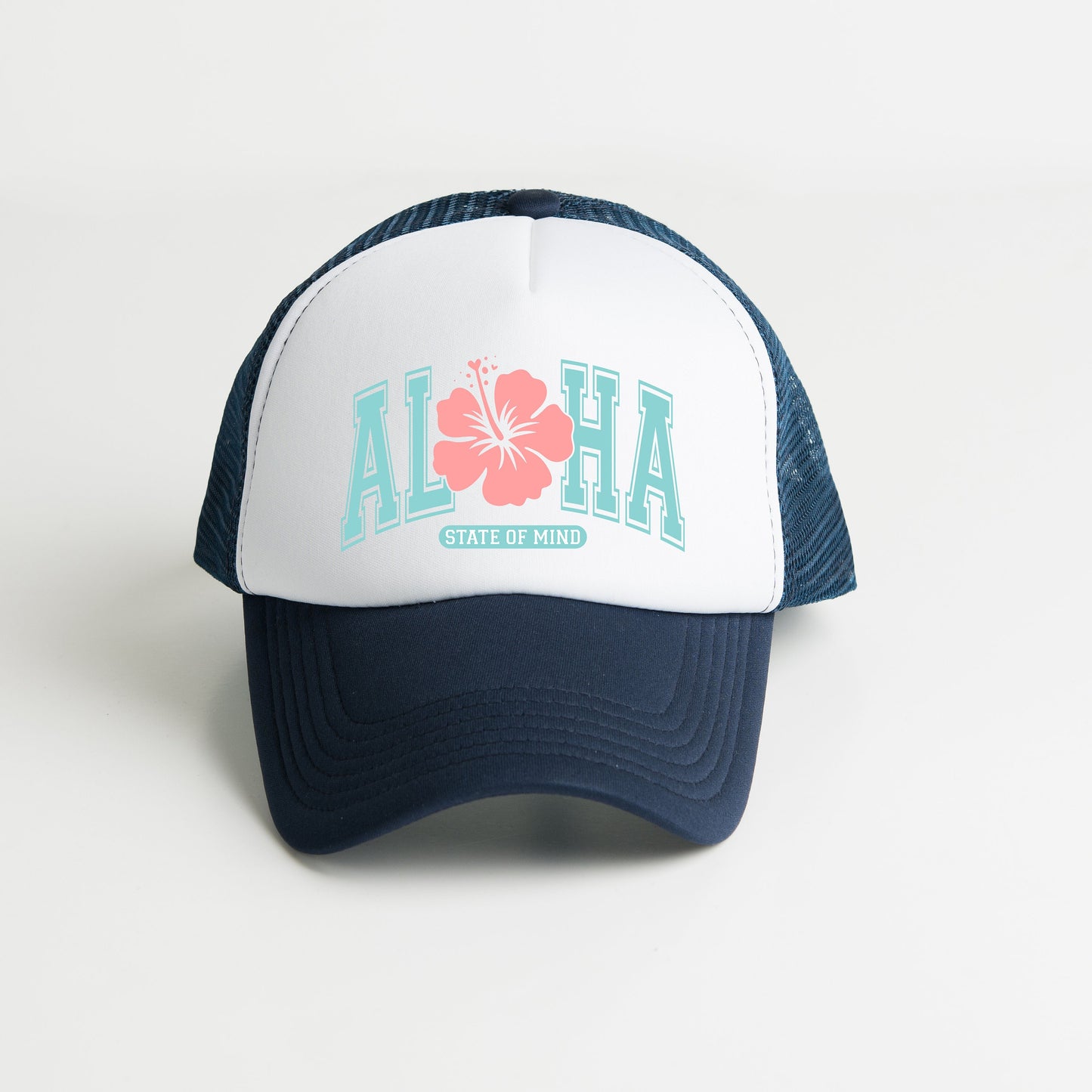 a white and blue hat with a flower on it