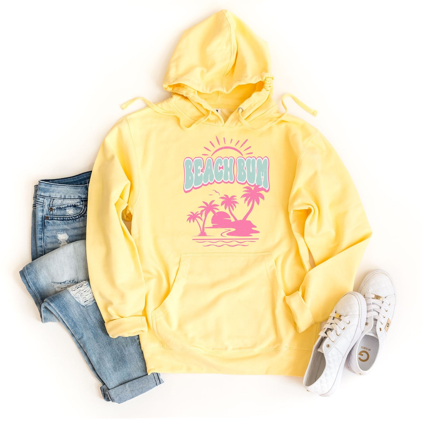 a yellow hoodie with the words beach bum on it