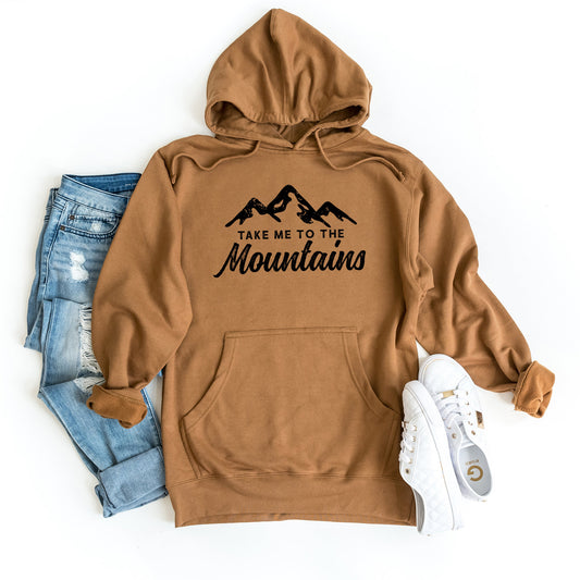a brown hoodie that says take me to the mountains