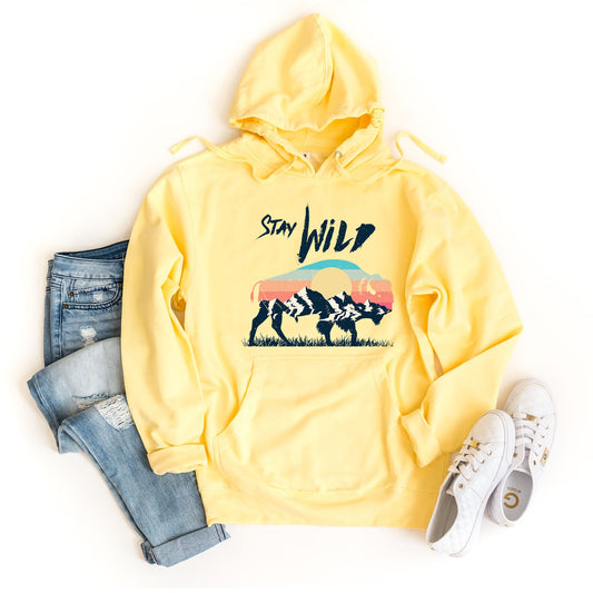 a yellow hoodie with the words wild on it