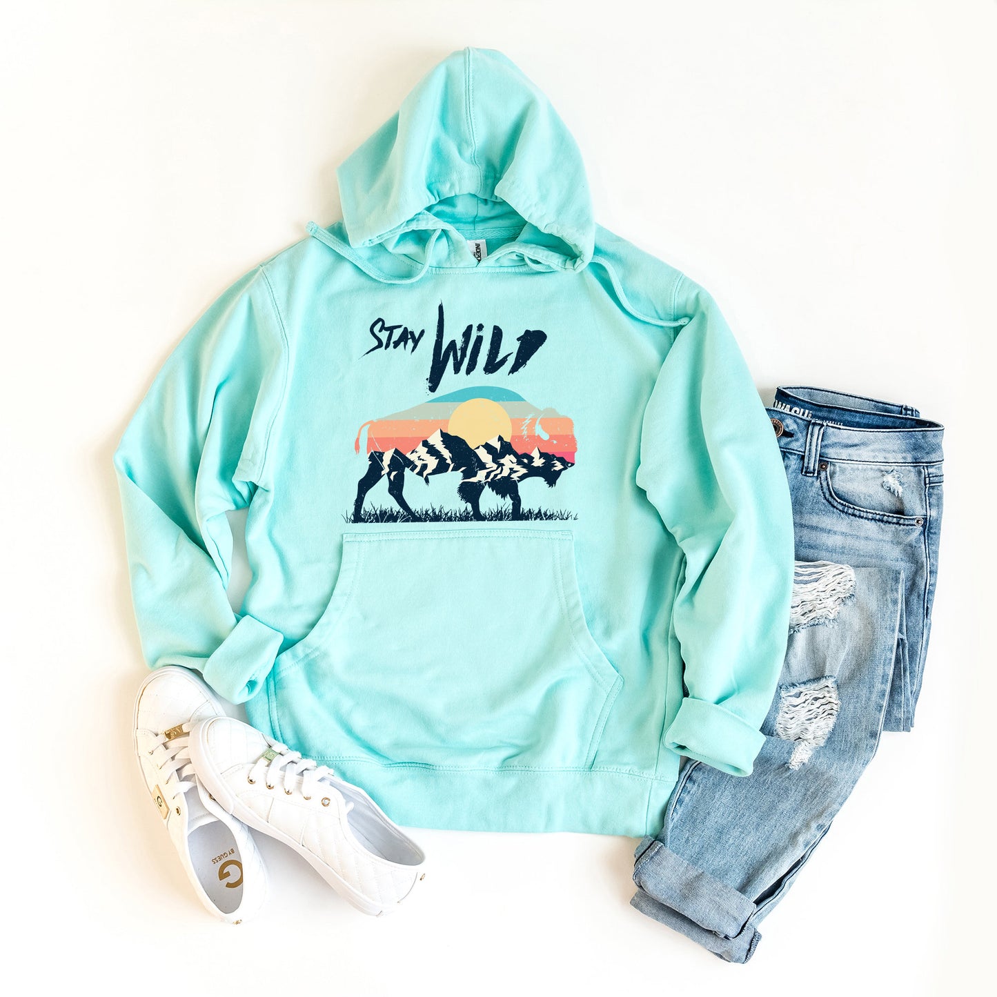 a blue hoodie with the words stay wild on it