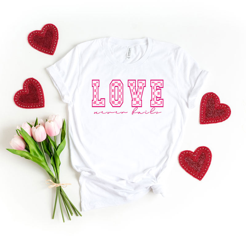 Love Never Fails Checkered | Short Sleeve Graphic Tee