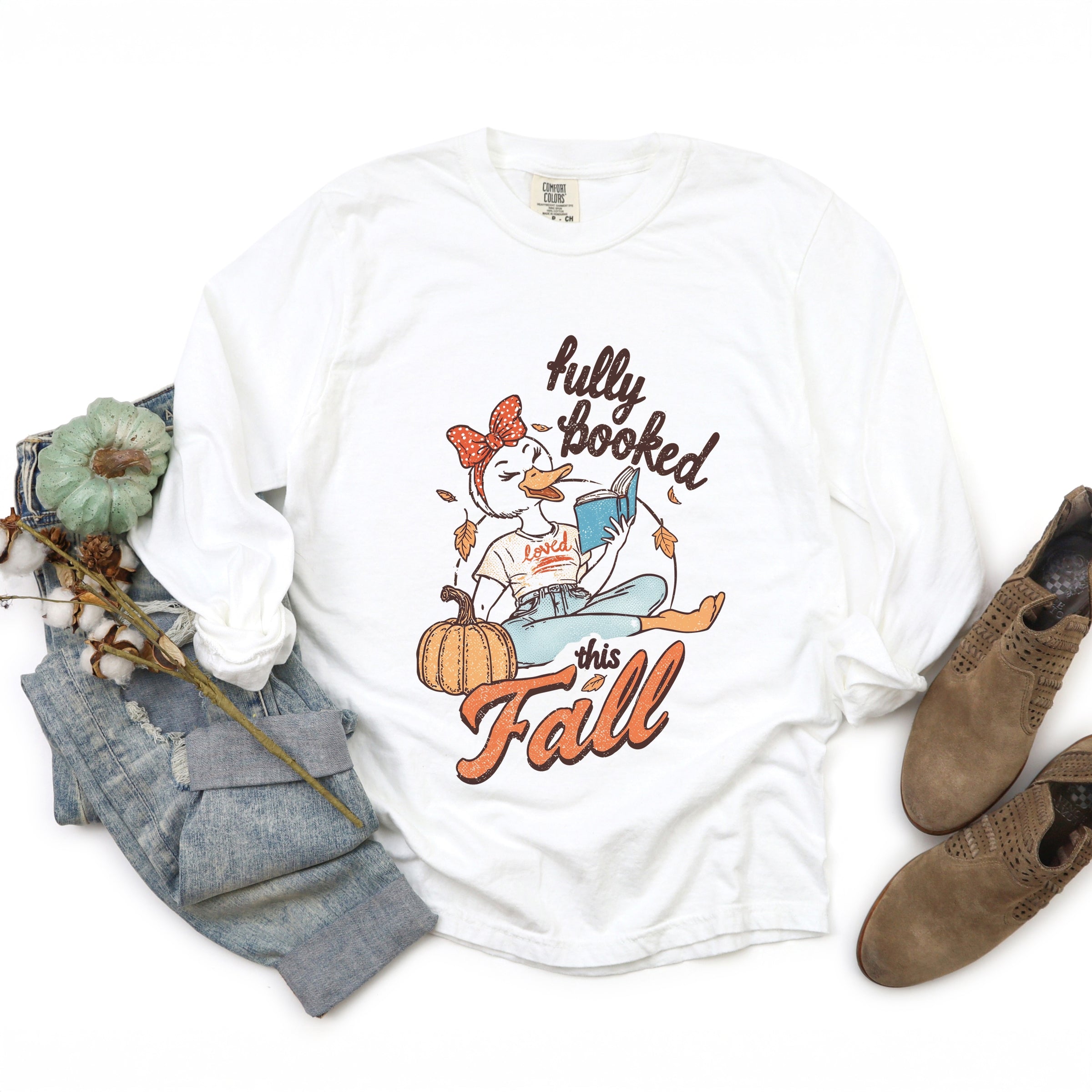 Fully Booked This Fall - Women's Garment Dyed Long Sleeve Graphic T-Shirt