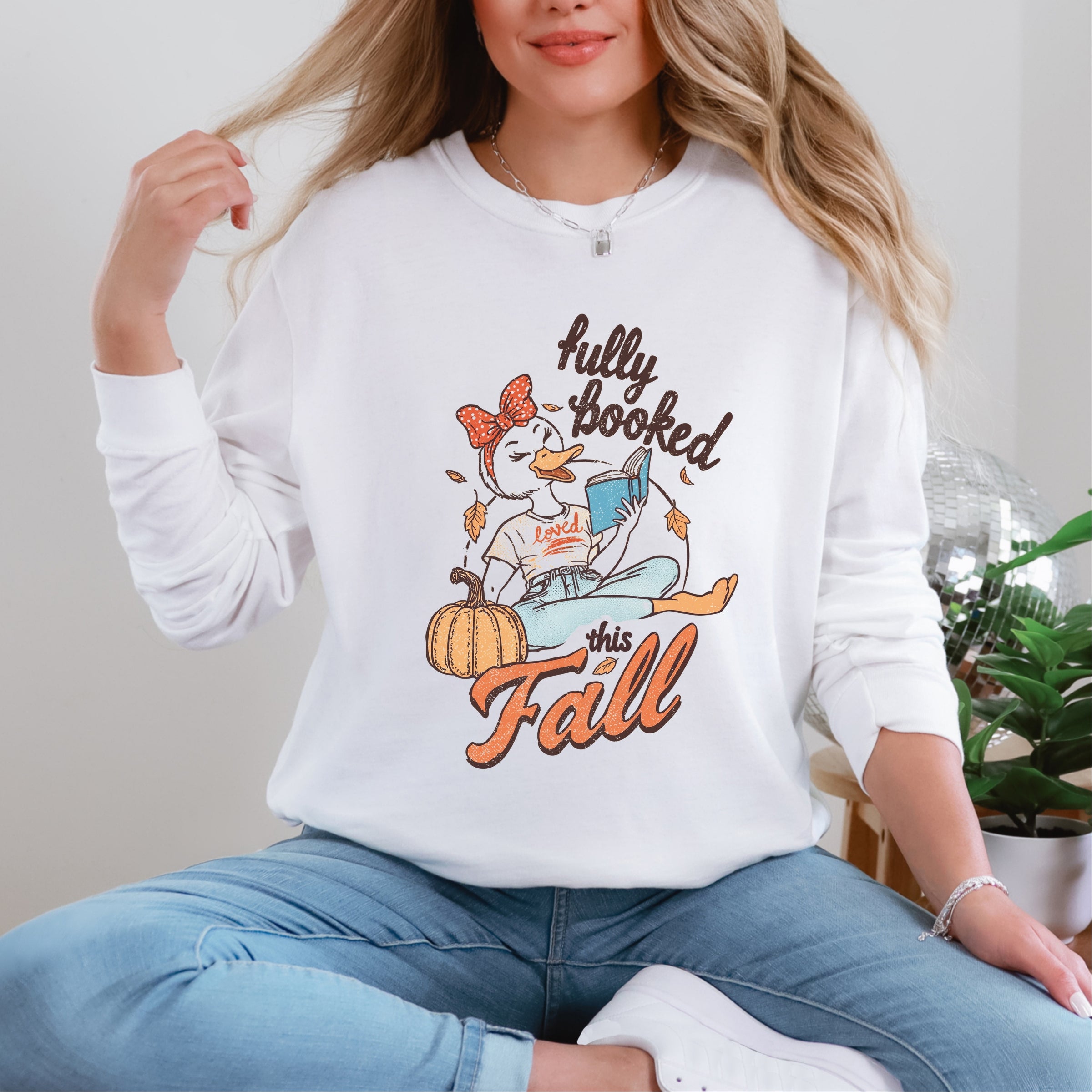 Fully Booked This Fall - Women's Garment Dyed Long Sleeve Graphic T-Shirt