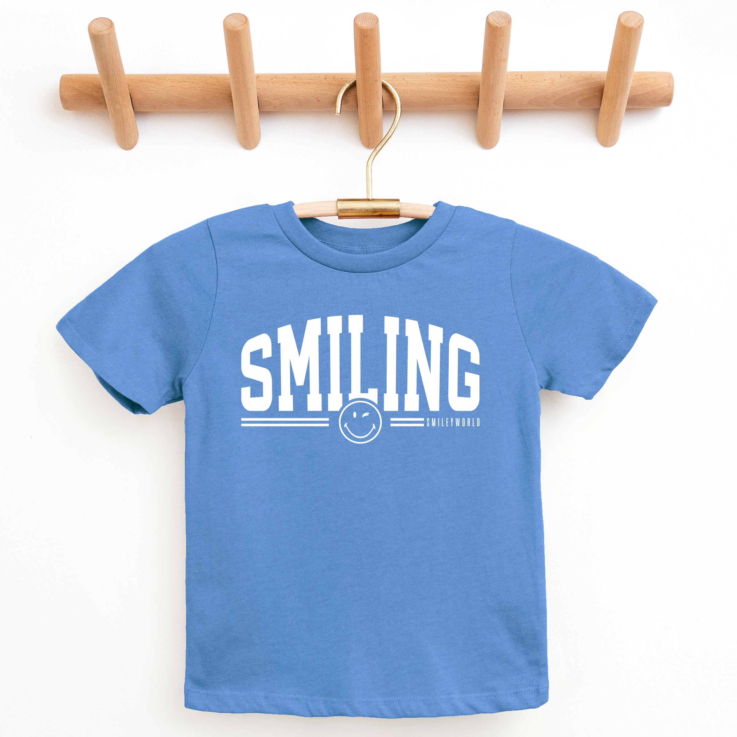 SmileyWorld Arched Varsity - Youth Short Sleeve Graphic T-Shirt