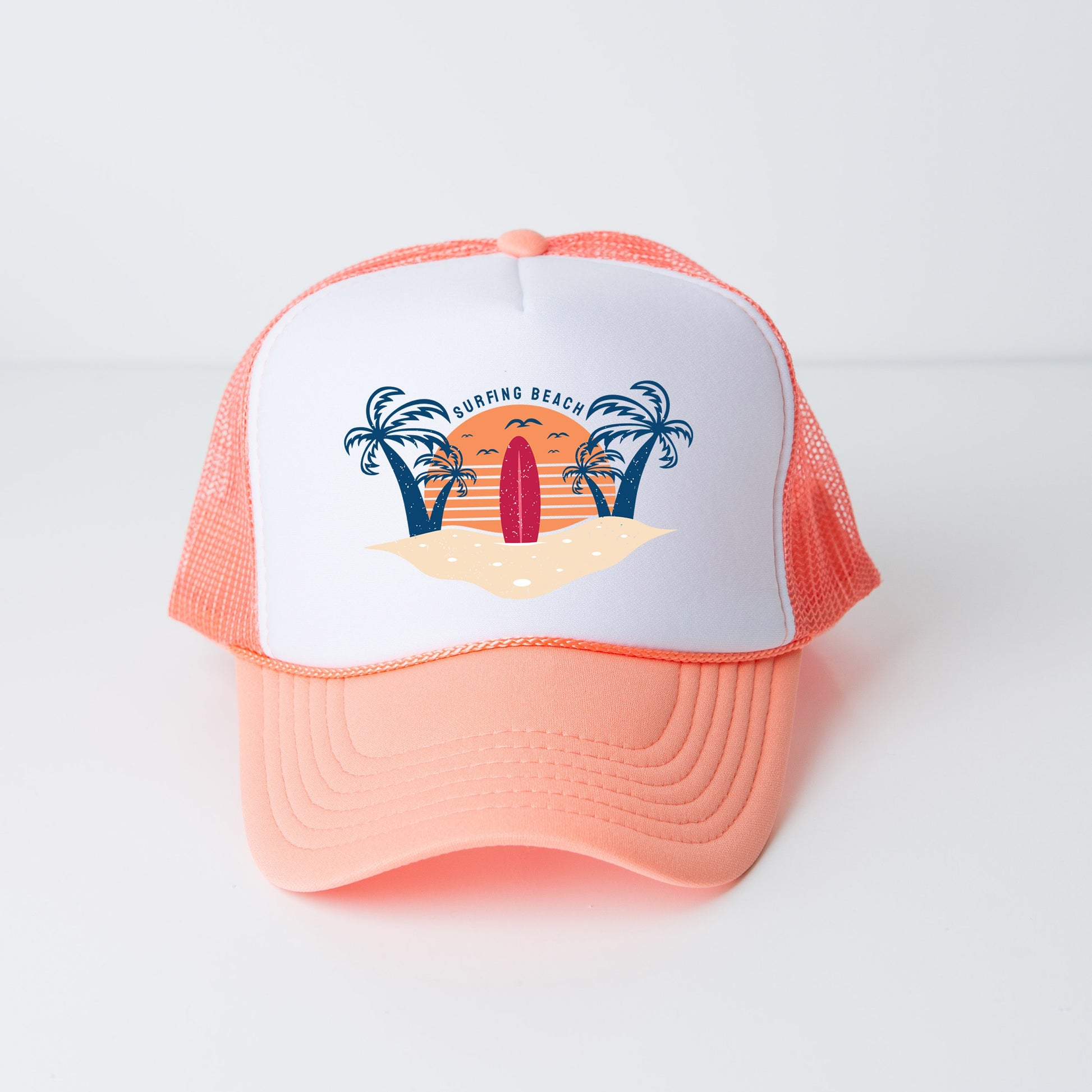 a pink and white trucker hat with a picture of a surfboard on it