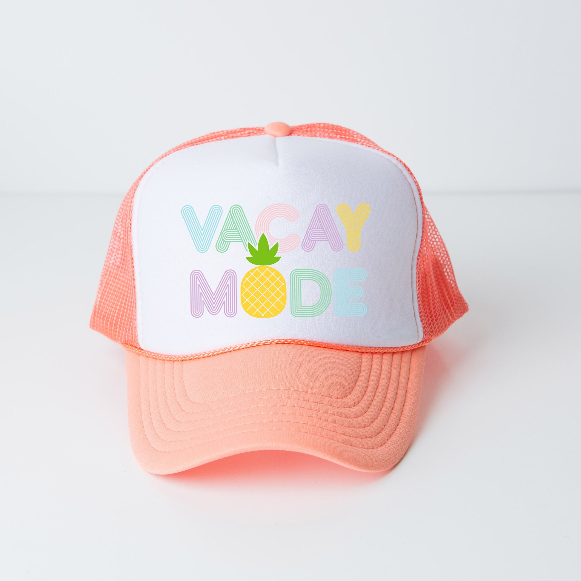 a pink and white trucker hat with the words vacay mode printed on