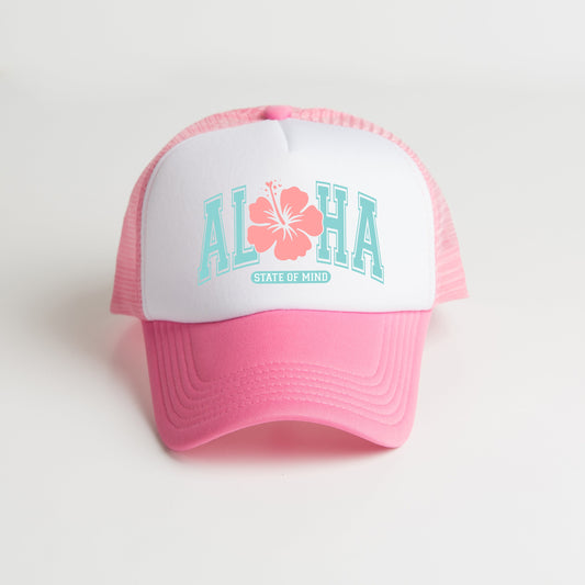 a pink and white trucker hat with the word ahana on it