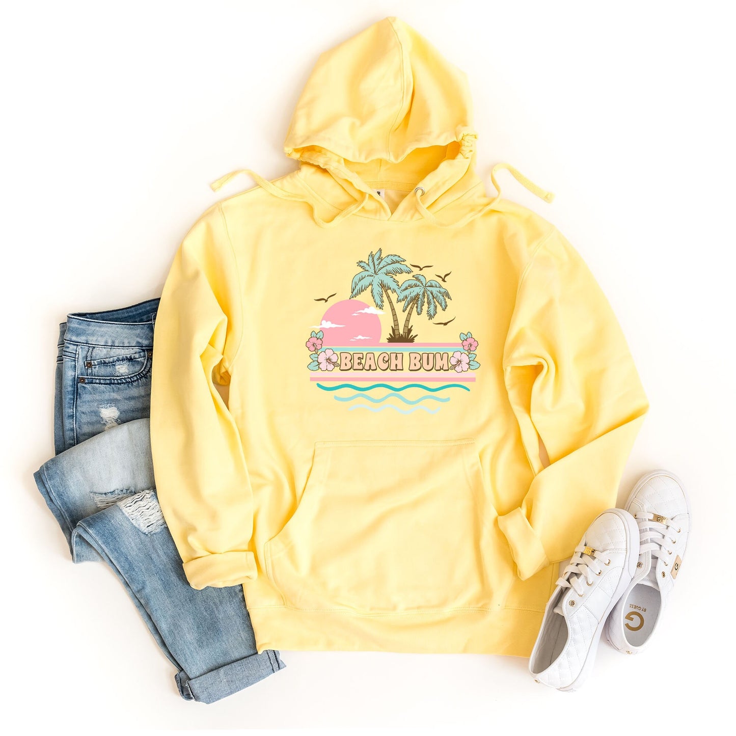 a yellow sweatshirt with a palm tree on it