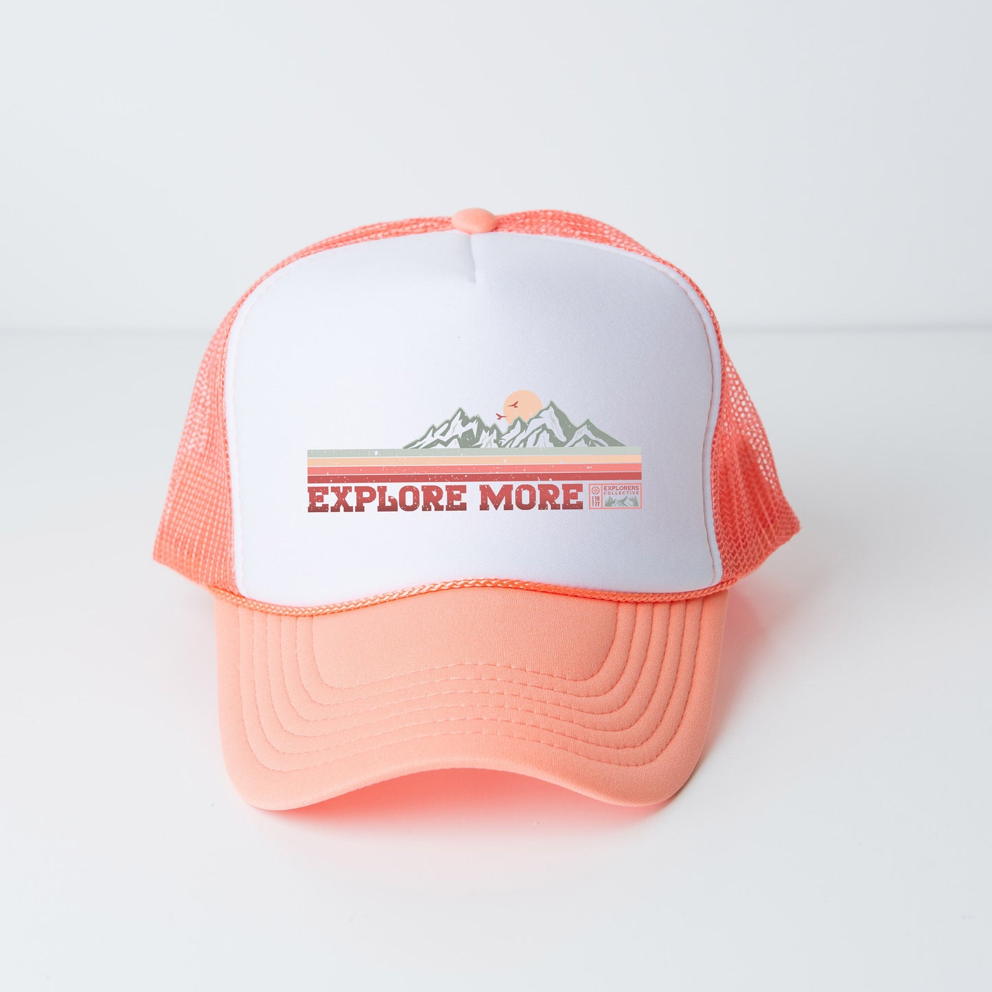 a trucker hat with the words explore more on it