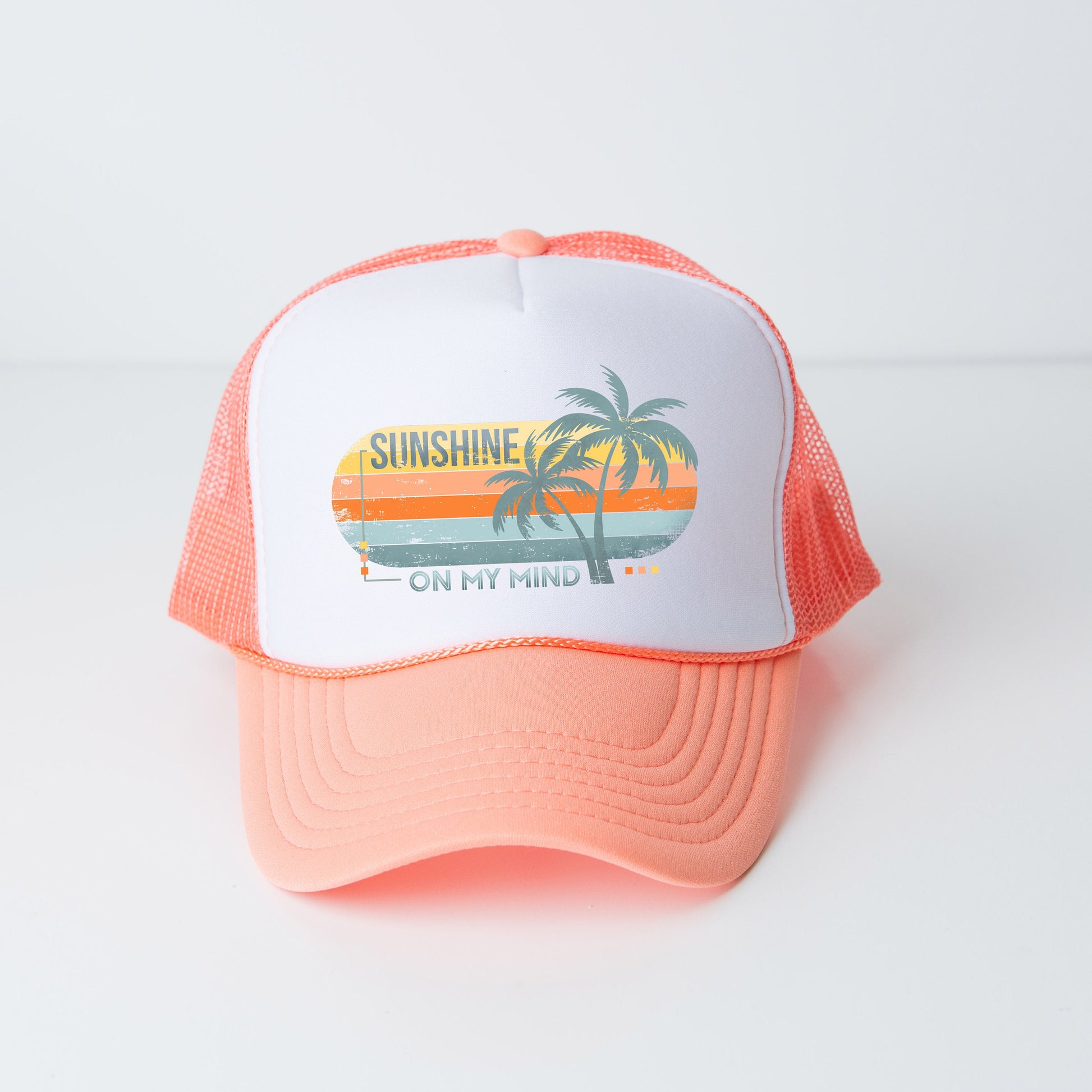 a pink and white trucker hat with the words sunshine on it
