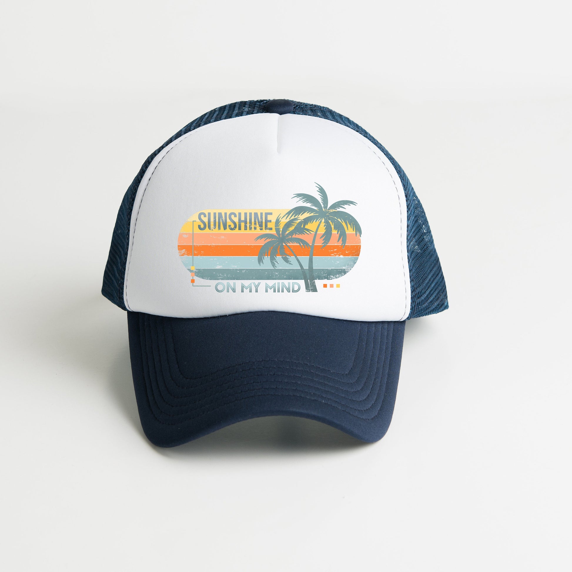 a white and blue hat with a palm tree on it
