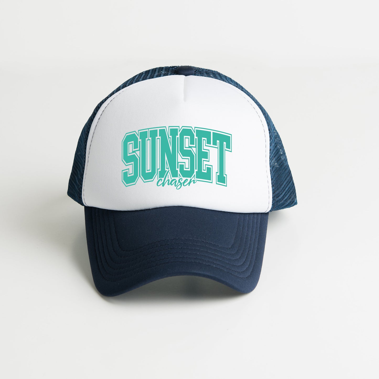 a white and blue hat with the word sunset on it