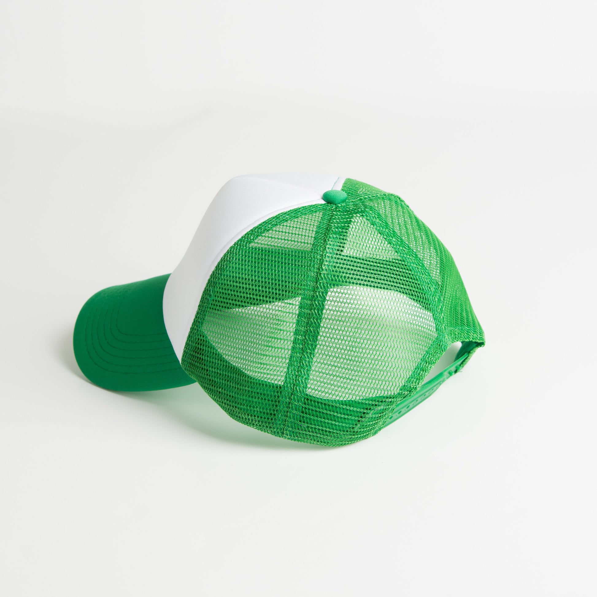 a green and white trucker hat on a white background