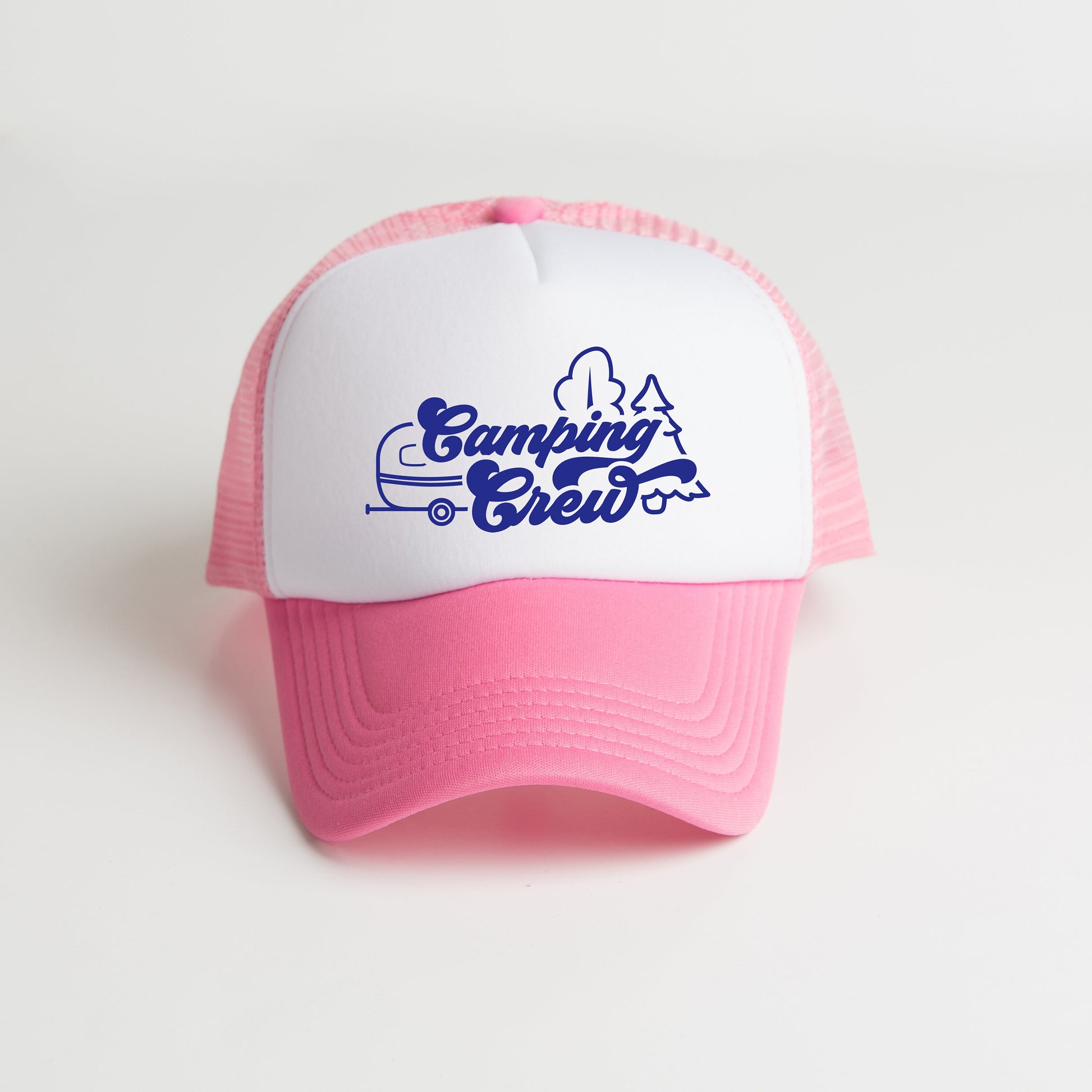 a pink and white trucker hat with the camping crew on it